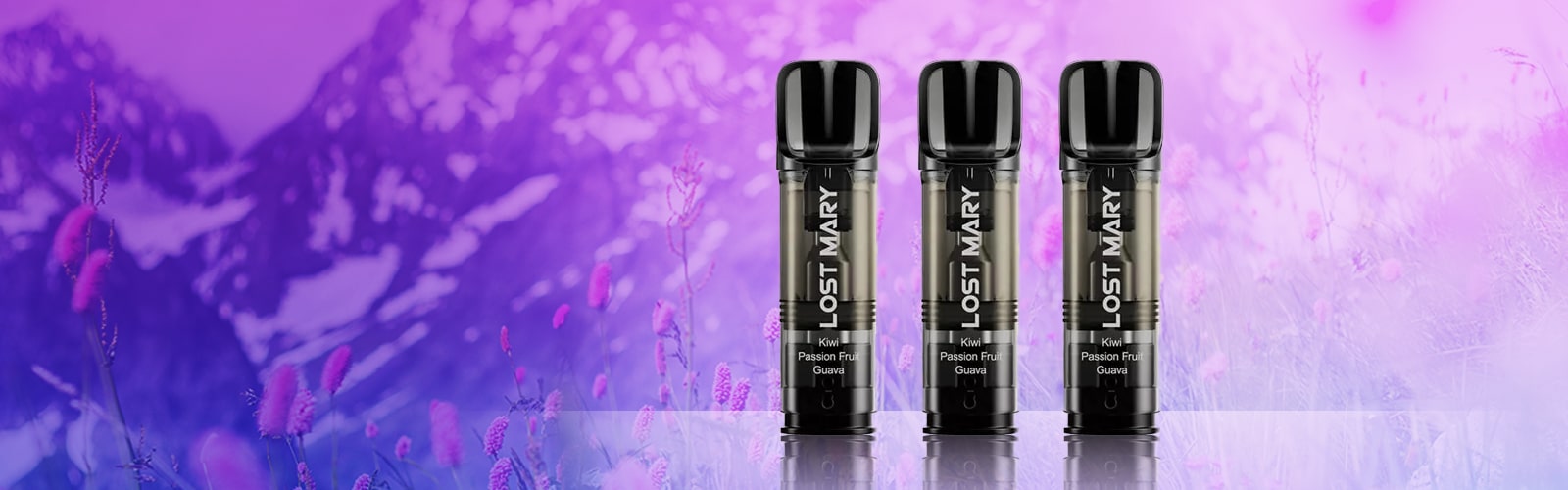 Drei Lost Mary Vapes Kiwi Passion Fruit Guava 20 mg vor violettem Berg- und Blumenhintergrund