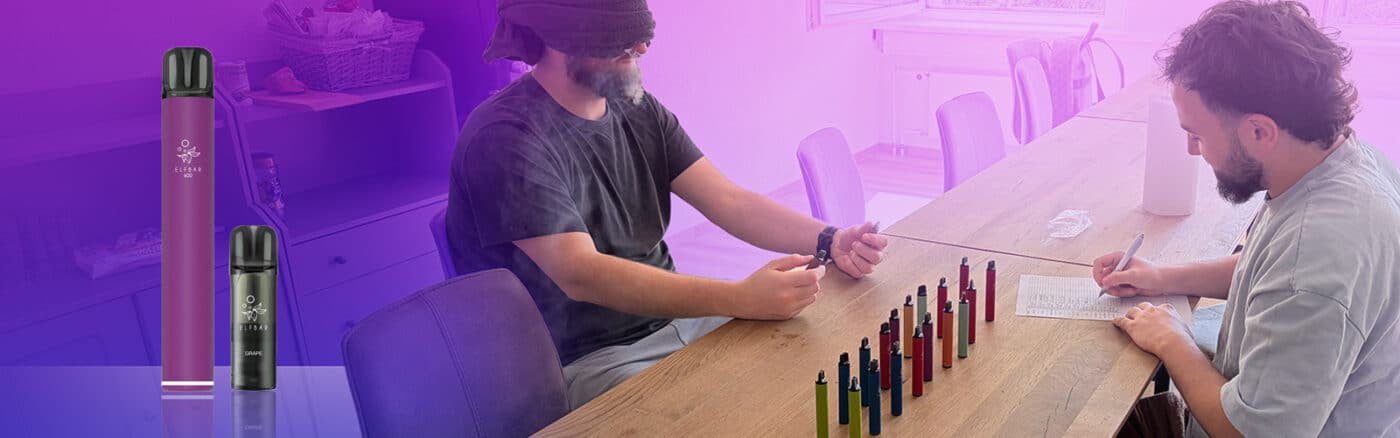 ELFBAR 600 Einweg-Vape in Grape (lila) und 20 mg Nikotin, neben weiteren ELFBAR-Geräten auf Stimmungsbild
