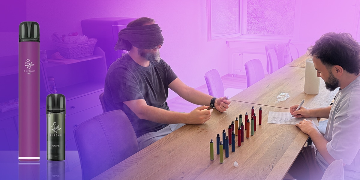 ELFBAR 600 Einweg Vape Grape in Lila und Schwarz, 20 mg, vor Szene mit Personen am Tisch und mehreren Vapes